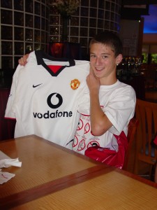 PROUD OWNER OF A MANCHESTER UNITED JERSEY